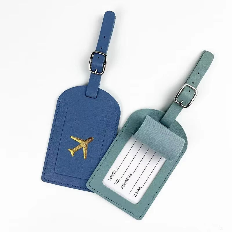 Stamped leather luggage tag | Engraved leather bag tag | Personalized leather travel tag | Genuine leather suitcase tag | Elegant leather luggage label | Leather luggage tag with buckle | Leather ID tag for suitcase | Luxury leather baggage tag | Leather name tag for luggage | Leather travel tag with ID window