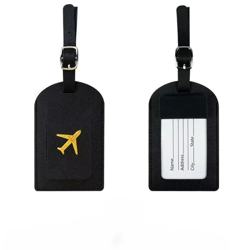 Stamped leather luggage tag | Engraved leather bag tag | Personalized leather travel tag | Genuine leather suitcase tag | Elegant leather luggage label | Leather luggage tag with buckle | Leather ID tag for suitcase | Luxury leather baggage tag | Leather name tag for luggage | Leather travel tag with ID window