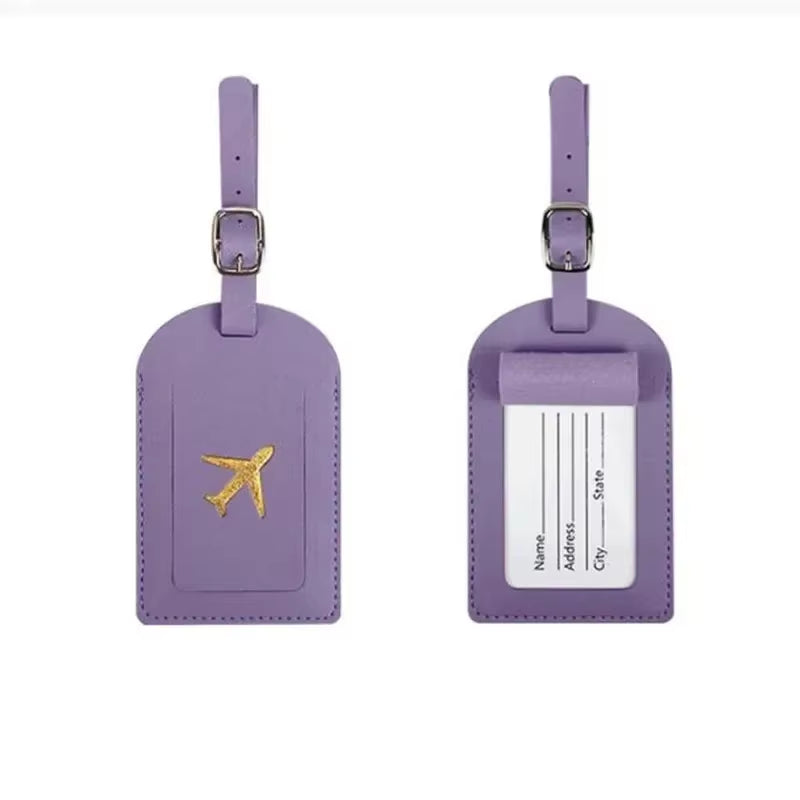 Stamped leather luggage tag | Engraved leather bag tag | Personalized leather travel tag | Genuine leather suitcase tag | Elegant leather luggage label | Leather luggage tag with buckle | Leather ID tag for suitcase | Luxury leather baggage tag | Leather name tag for luggage | Leather travel tag with ID window