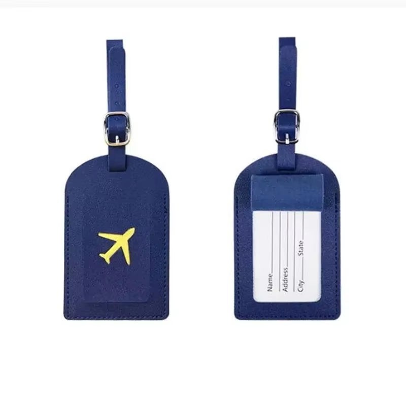 Stamped leather luggage tag | Engraved leather bag tag | Personalized leather travel tag | Genuine leather suitcase tag | Elegant leather luggage label | Leather luggage tag with buckle | Leather ID tag for suitcase | Luxury leather baggage tag | Leather name tag for luggage | Leather travel tag with ID window